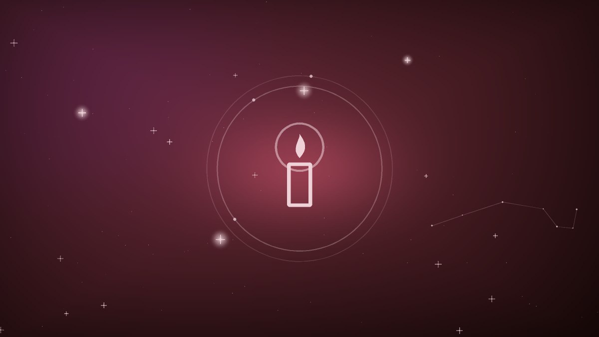 Single lit candle in soft rose colored light