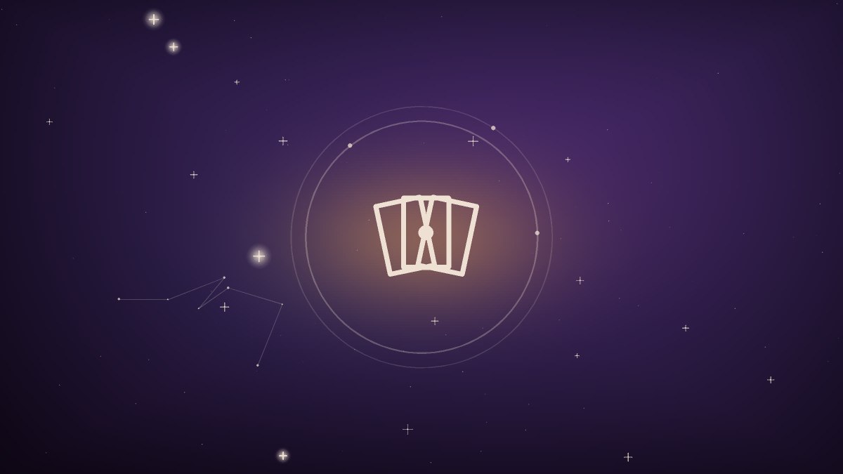 Cards spread beneath a crescent moon