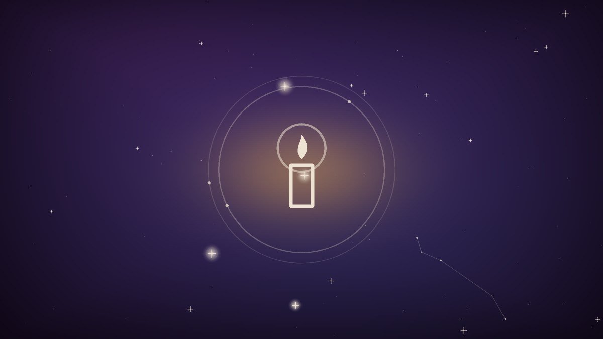 A single candle burning beside a phone screen