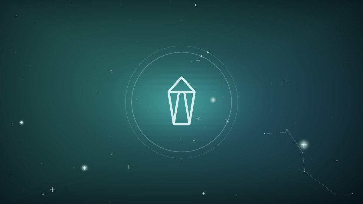 A clear crystal resting on a cloth in soft teal light